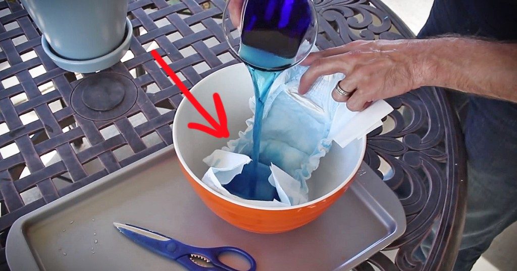 Why This Guy Is Pouring A Blue Liquid On A Diaper?